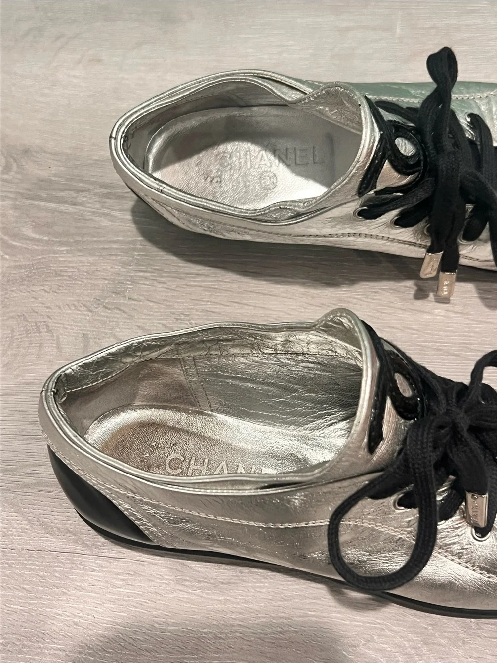 CHANEL Silver and Black Low-Top Lace-Up Sneaker